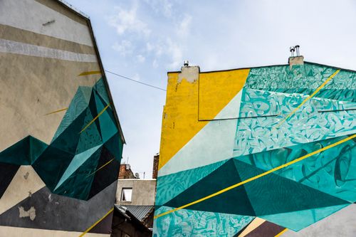 Free Colorful urban murals on buildings depicting modern abstract art in Lviv, Ukraine. Stock Photo