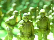 Green Army Toys Selective-focus Photography