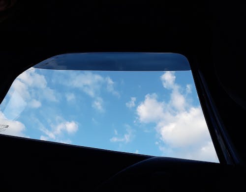 Foto d'estoc gratuïta de cel, cel blau, cotxe