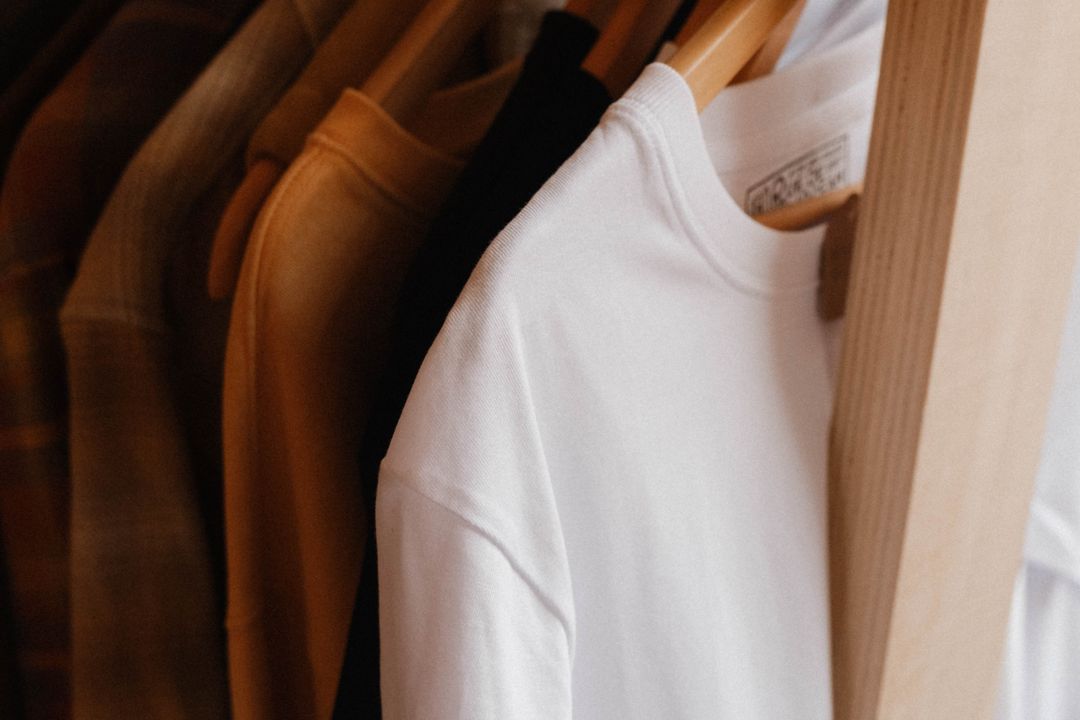 Close-up of Clothes Hanging on a Clothing Rack