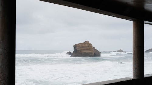 A view of the ocean from a window