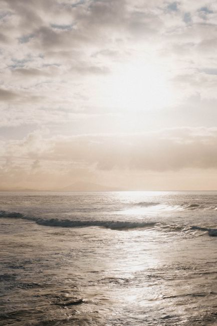 Beautiful sunrise over the ocean in Biarritz, France, capturing waves and serene seascape.