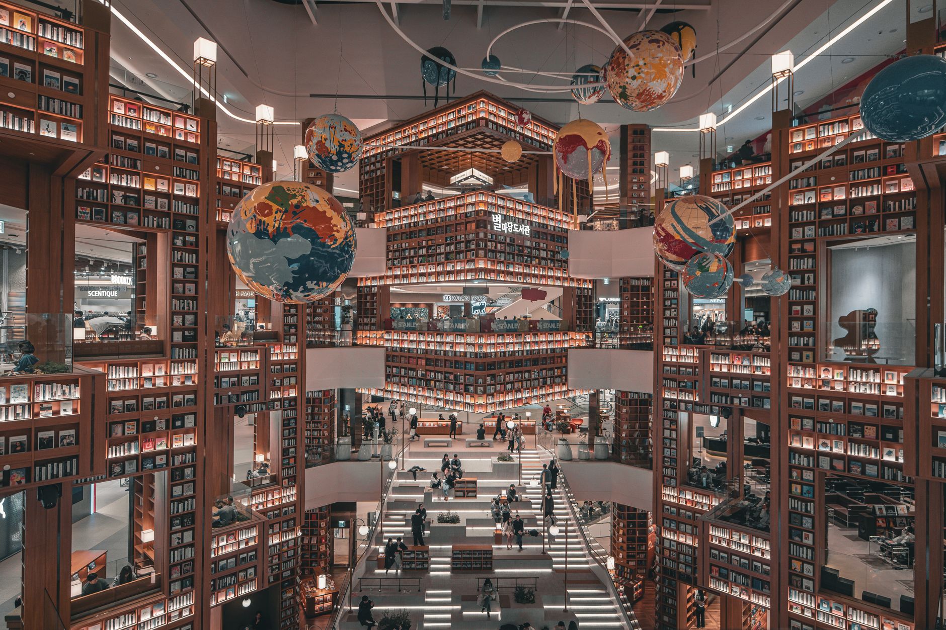 Discover the breathtaking architecture and vast bookshelves of Starfield Library in Seoul, South Korea.