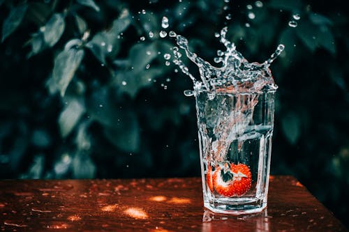 Free Close Up Photo of Water Splashing from Glass  Stock Photo