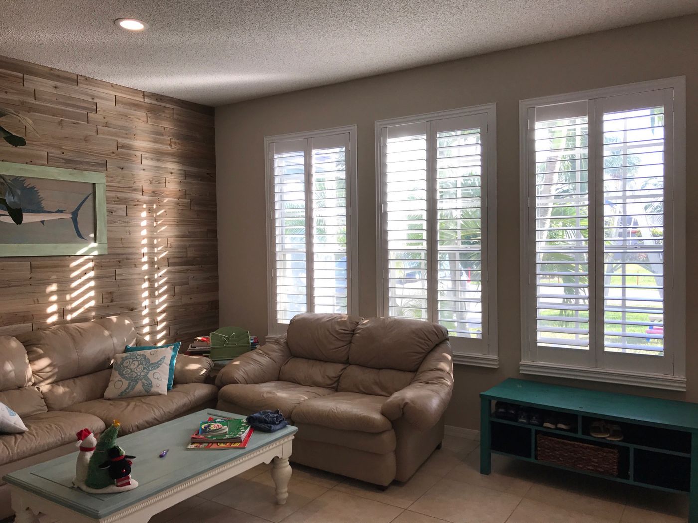 Complete modern home interior with coordinated wall paneling and furniture