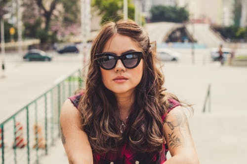 Portrait of Woman Wearing Black Sunglasses