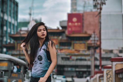 Woman Wearing Blue Sleeveless Top