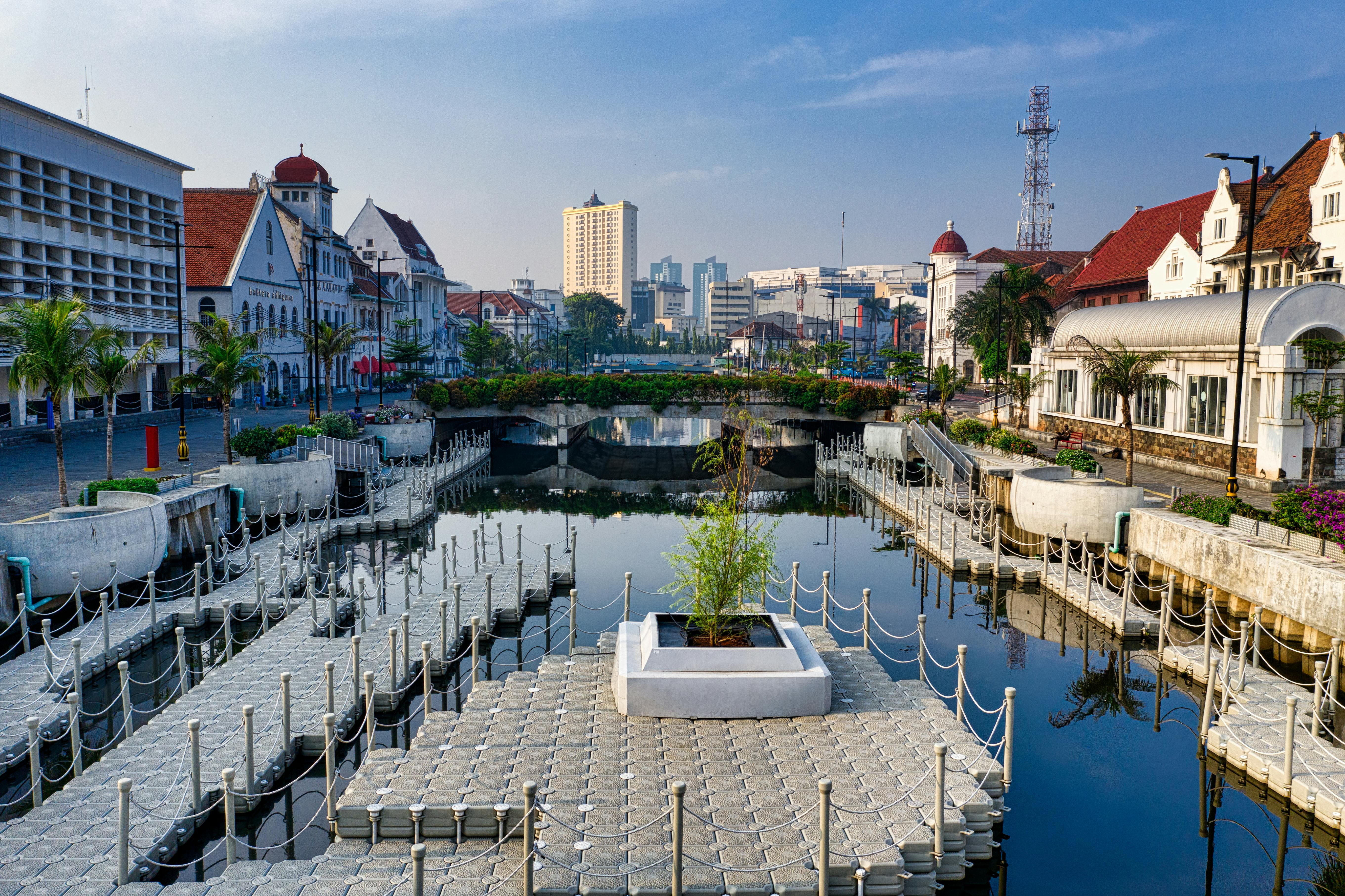 Gray Concrete Docking Platforms Between High Rise Buildings