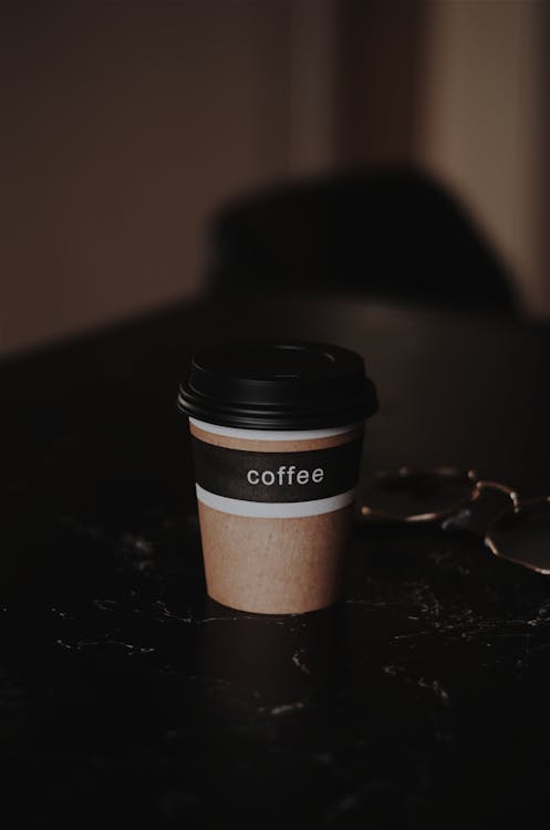 Free Brown and Black Coffee Disposable Cup With Lid Stock Photo