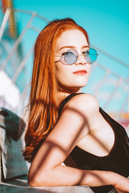 Free Woman Wearing Sunglasses Looking Her Right Side Stock Photo