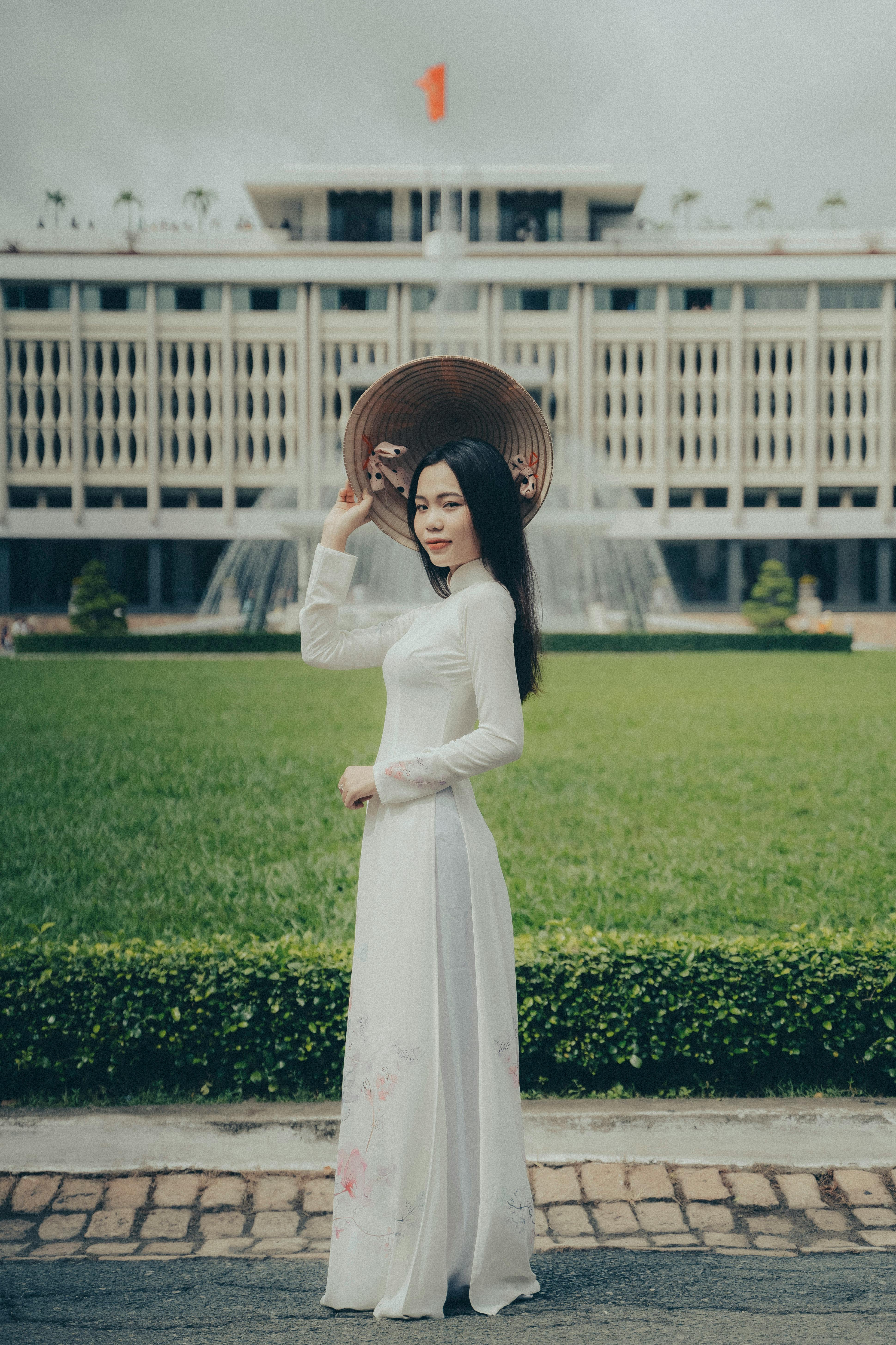 Image Quang Linh Vlog image beautiful image beautiful image beautiful image beautiful image beautiful image beautiful - Young Woman in a Traditional Ao Dai Posing in Front of the ...