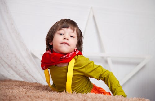 Toddler Wearing Red Scarf