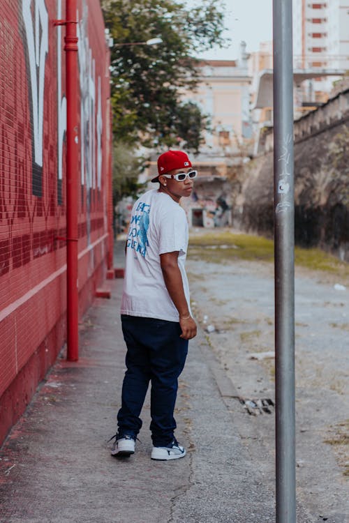 Foto profissional grátis de adolescente, ao ar livre, cidade