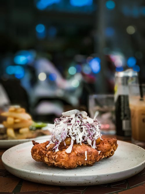 Free Round White Ceramic Plate With Fried Food Photo Stock Photo