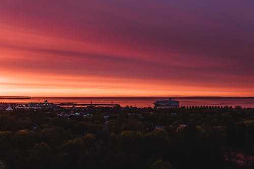 View Of Sunset With Red Sky