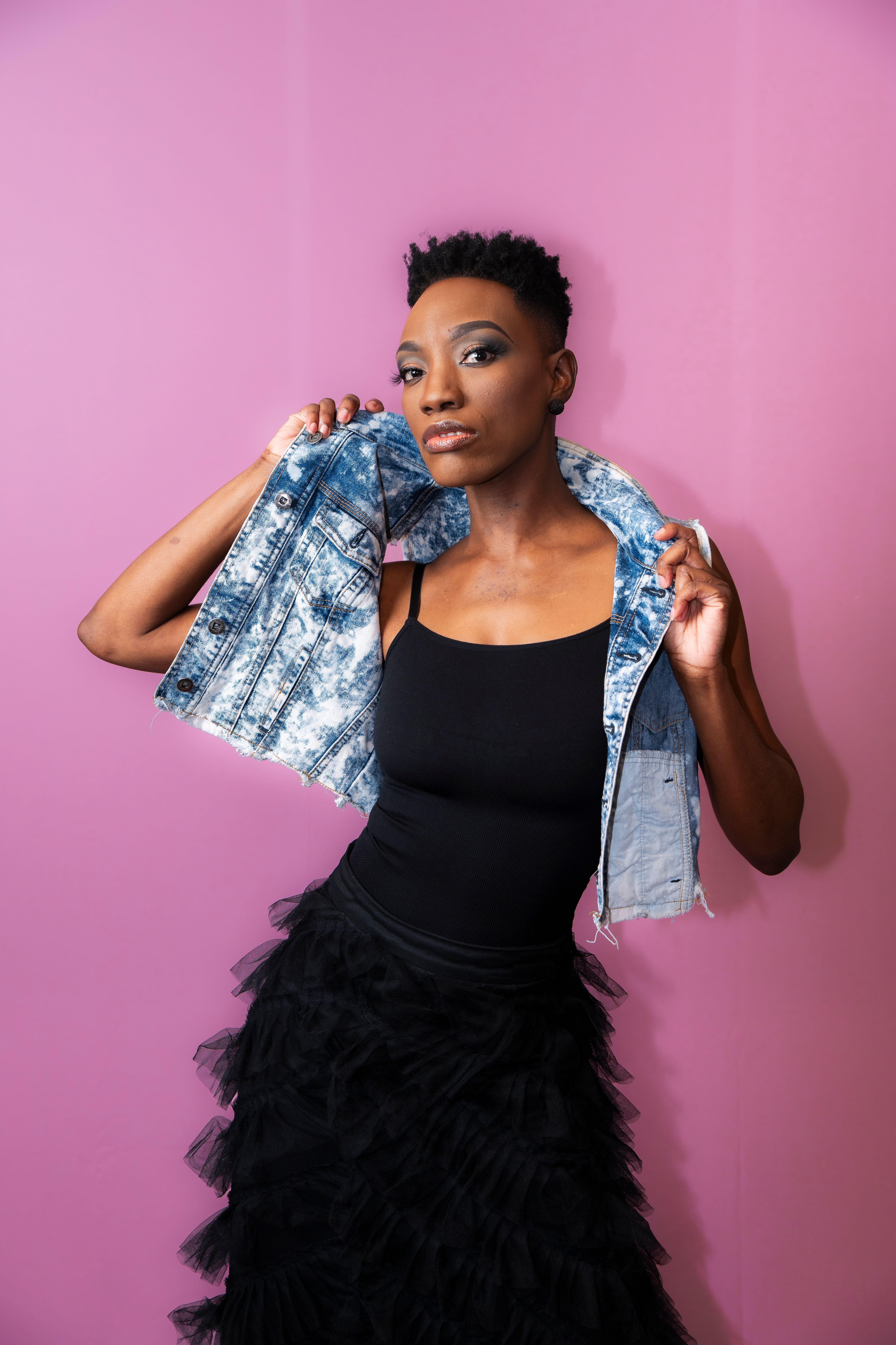 Woman in Black Dress and Jean Vest  Free Stock Photo