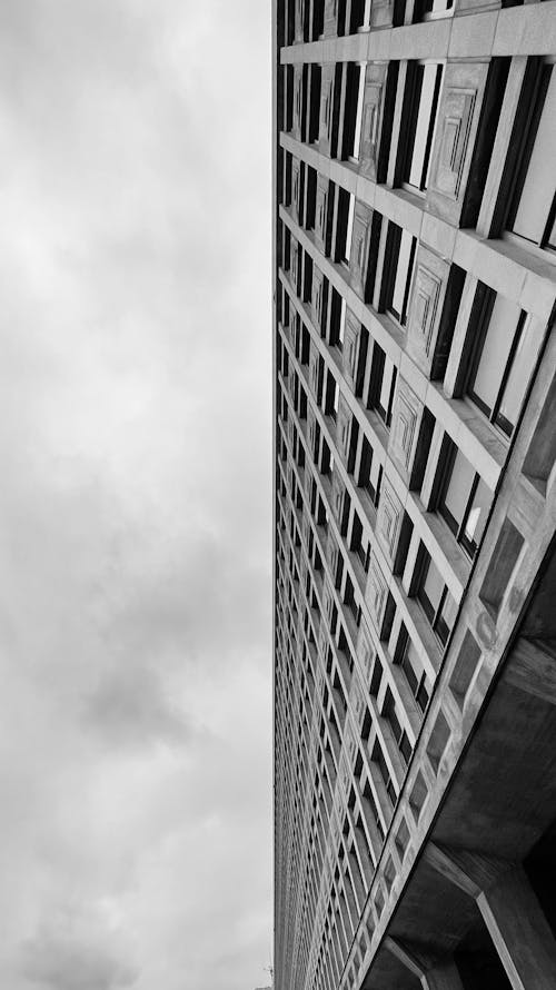 Free stock photo of big building, black and white, clouds