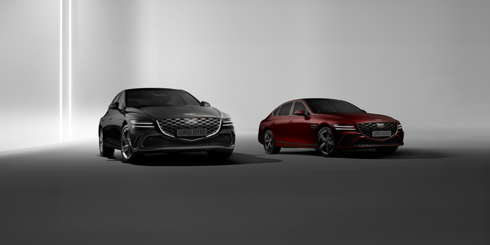 Showcasing elegant Genesis G80 sedans under refined studio lighting.