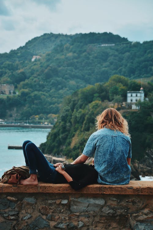 Woman Lying On Man's Lap