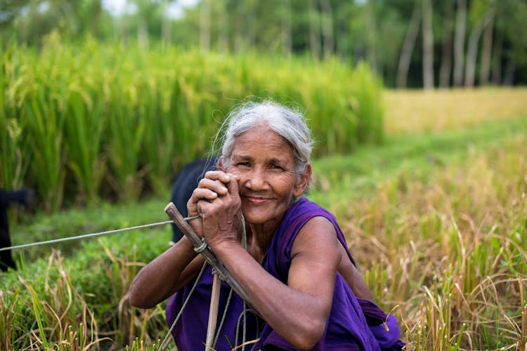 Smiling Woman At The Field