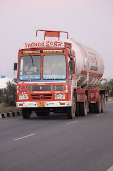 Indane gas tanker truck driving on a highway in Dindigul, Tamil Nadu, India.