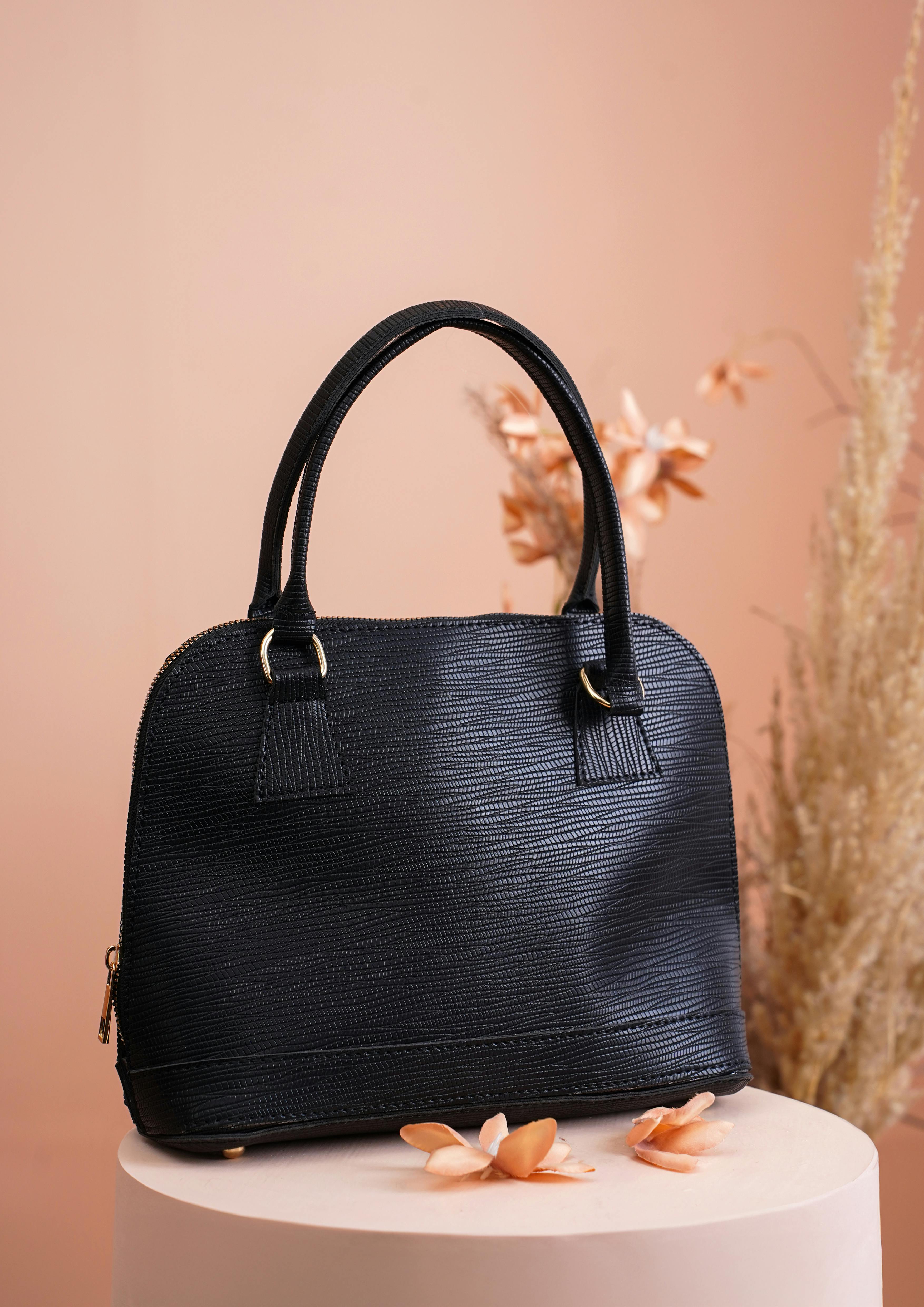 black womens handbag on display