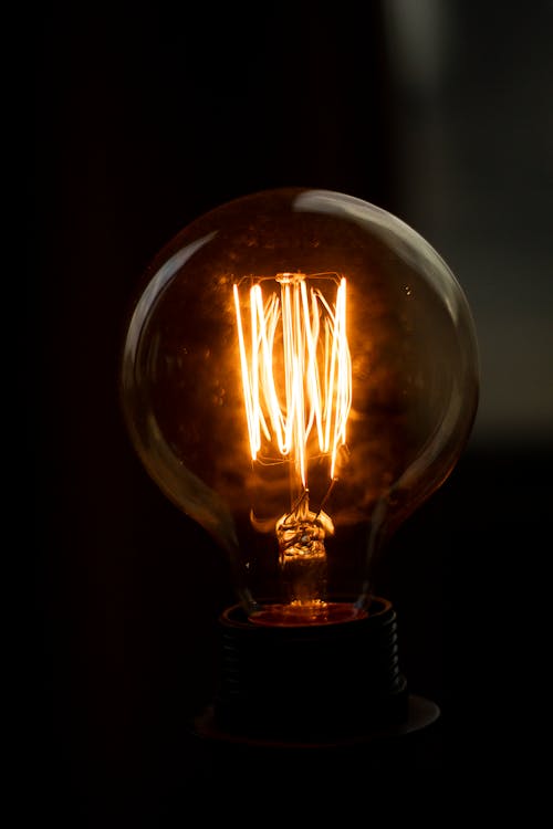 Free Lighted Clear Light Bulb Stock Photo