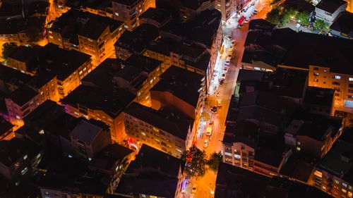 Free A vibrant aerial view of illuminated Istanbul streets and rooftops at night. Stock Photo