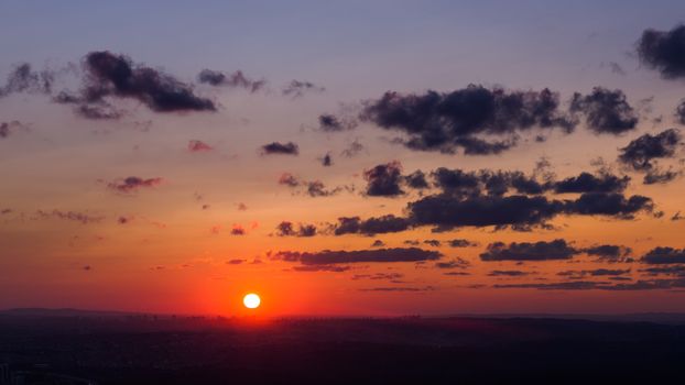 Stunning sunset over Istanbul with vibrant colors and dramatic clouds.