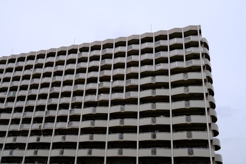 A large building with many balconies on it