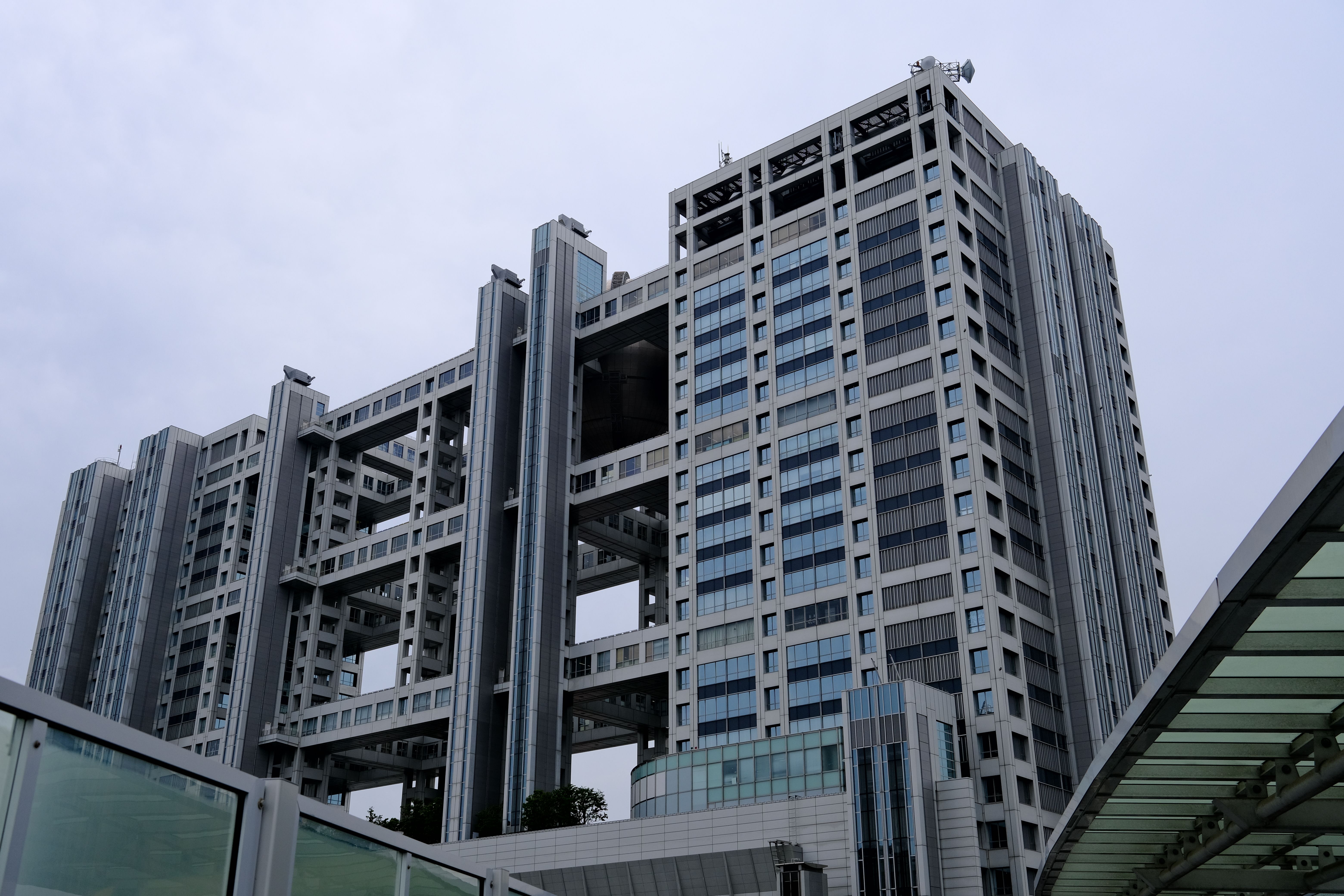 Capture of a modern urban building showcasing innovative architecture in Tokyo, Japan.