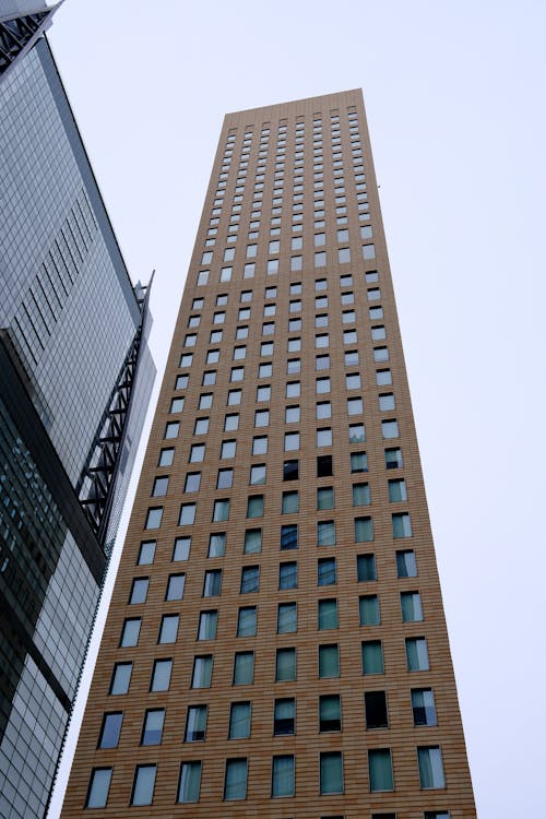 A tall building with windows and a tall building