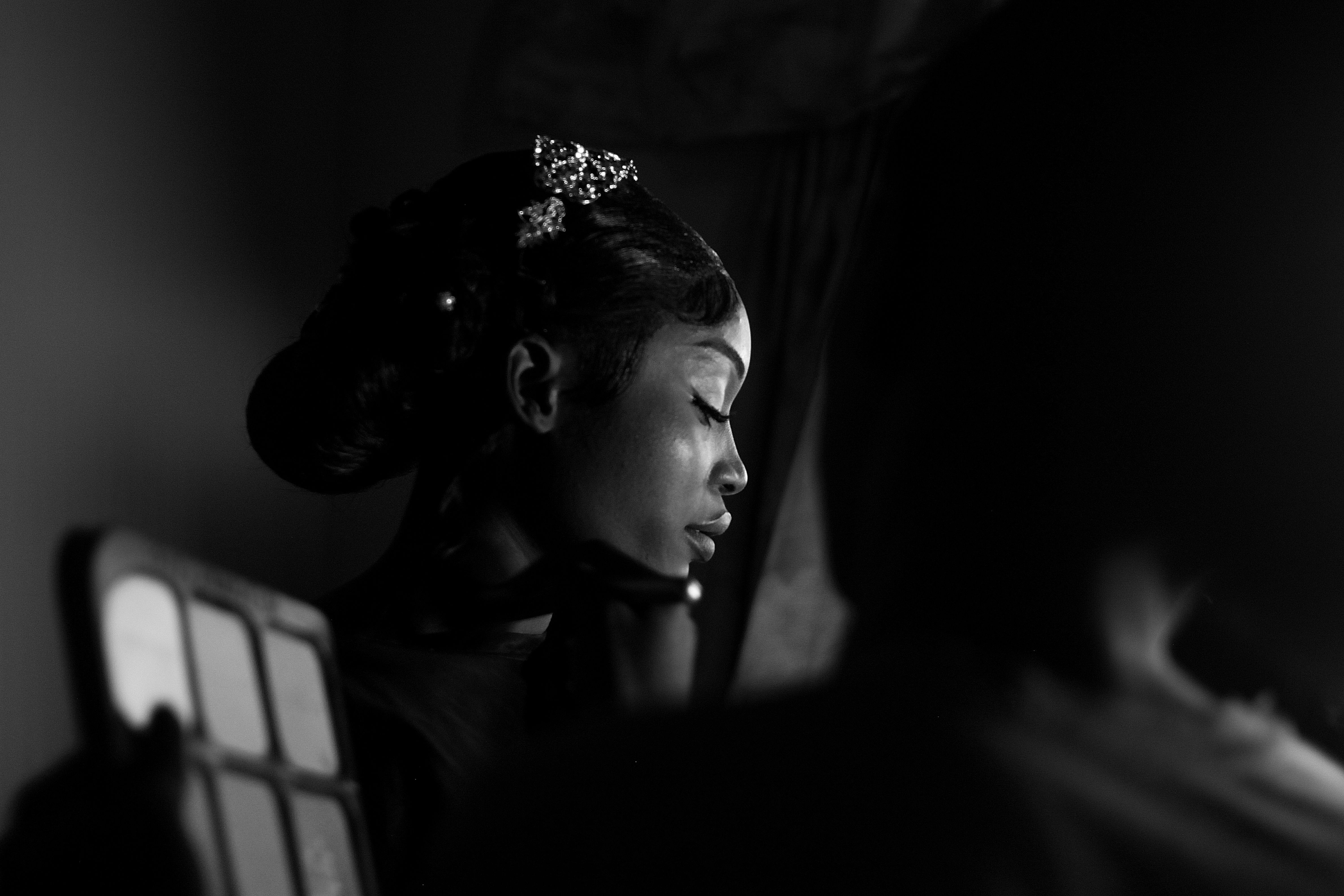 Stunning black and white portrait of a woman with elegant makeup.
