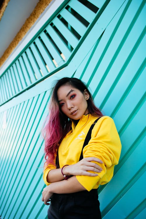 Free Women's Yellow and Black Long Sleeve Shirt Stock Photo