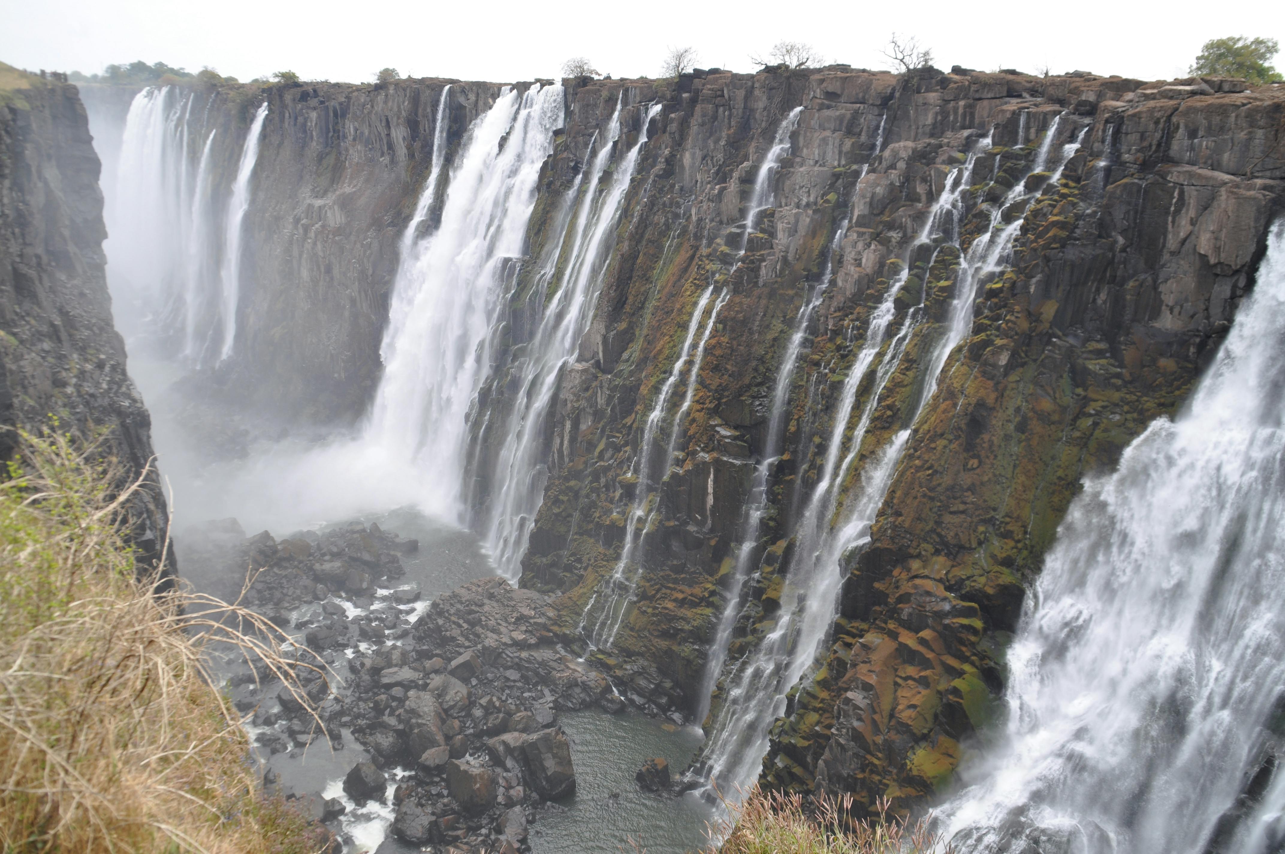 rough cliffs with waterfalls and foam