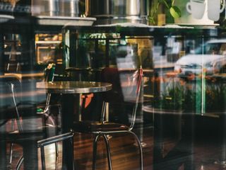 Cozy bar area with wooden stools