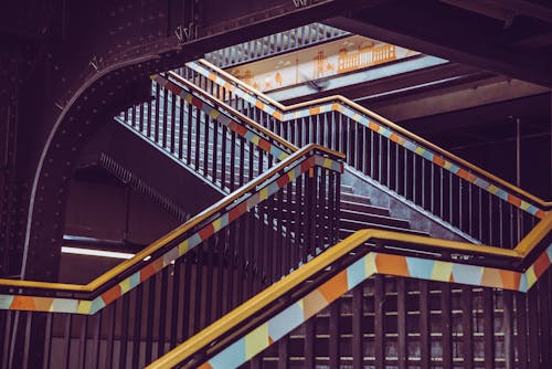 A stairway with colorful stripes on it