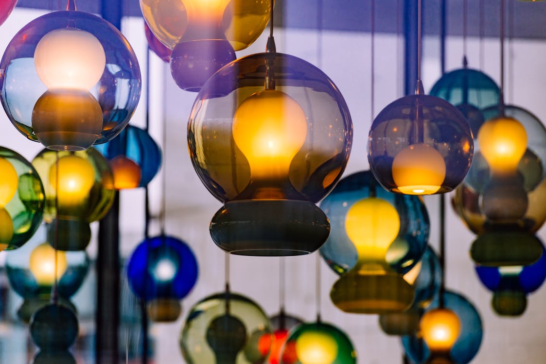 A group of colorful glass hanging lights