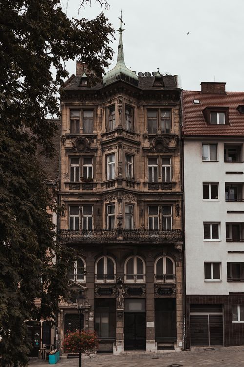 Free Explore the vintage architectural charm of the Salvator Pharmacy building in Bratislava's urban landscape. Stock Photo