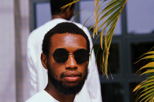 Portrait of a man wearing black sunglasses