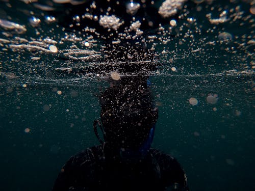 Free A Person Underwater Stock Photo
