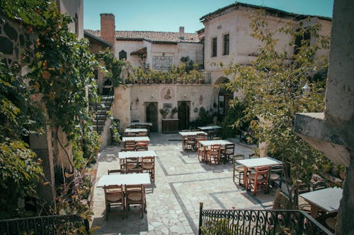 Free Tables and Chairs Outside a Restaurant Stock Photo