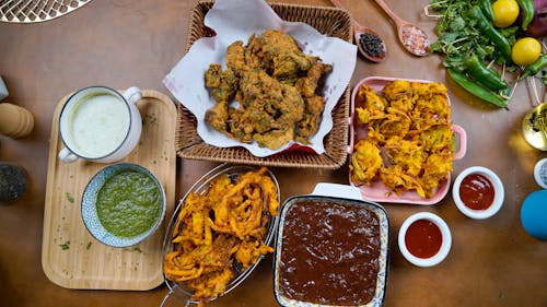 Traditional Desi Pakora with Mint and Green Sauces- Popular Pakistani  Snack