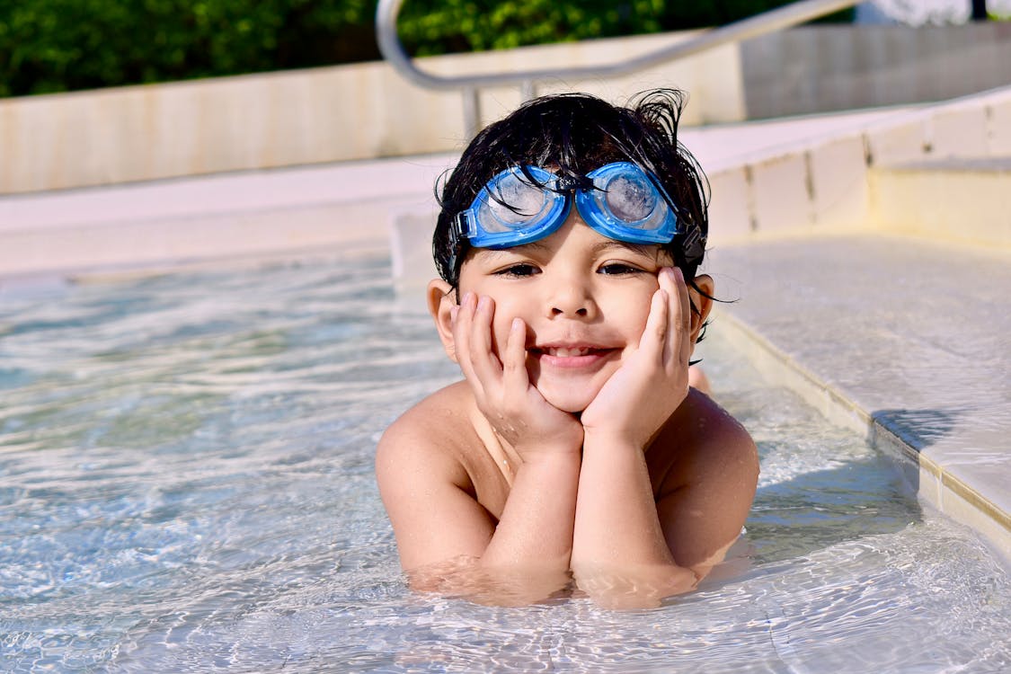 Free Boy In A Pool Stock Photo
