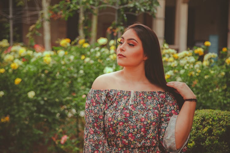 Woman Wearing Off Shoulder Floral Dress