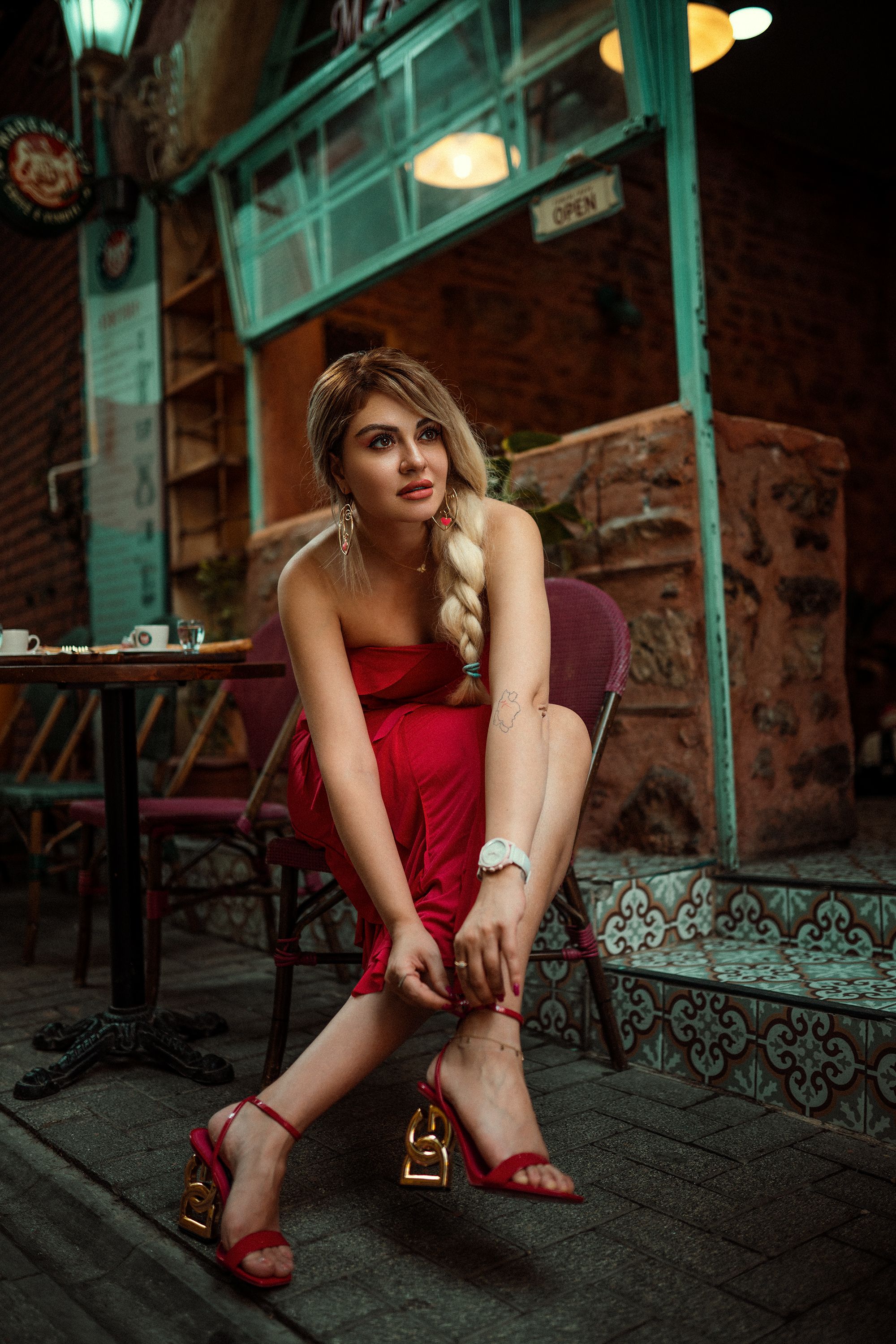 princess polly baby blue dress Blonde Model in Red Dress Sitting on Chair on Street · Free Stock Photo