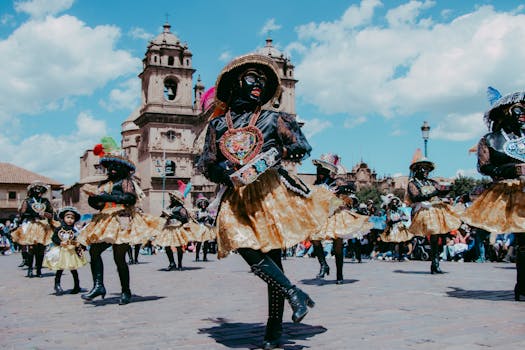 Vibrant traditional Qhapaq Negro dance performance during festival in Cusco, Peru.