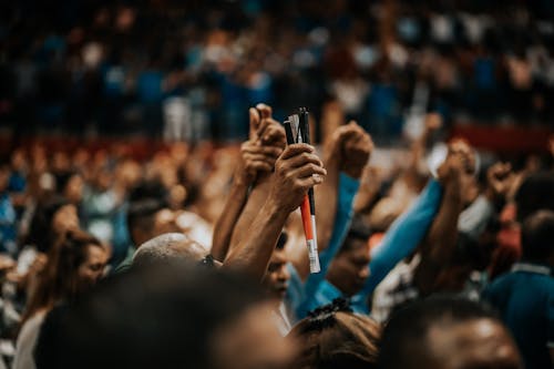 People Raising Their Hands