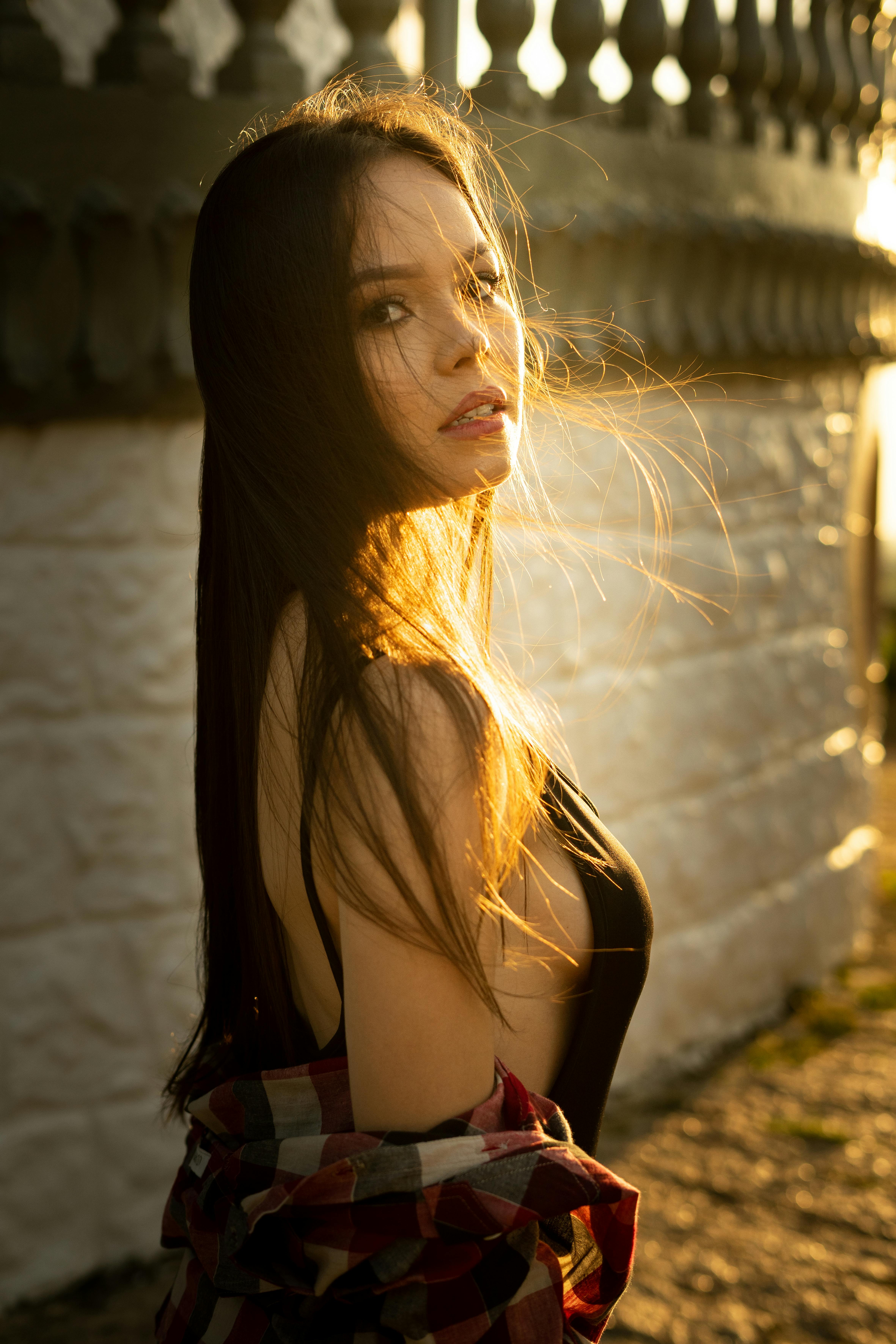 Download A Girl With Long Black Hair Looking Up