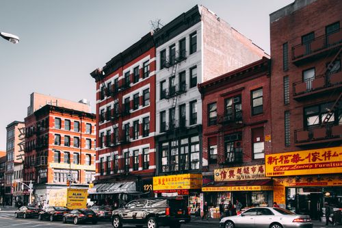 Free Vibrant Chinatown street scene showcasing historic architecture and bustling urban life. Stock Photo